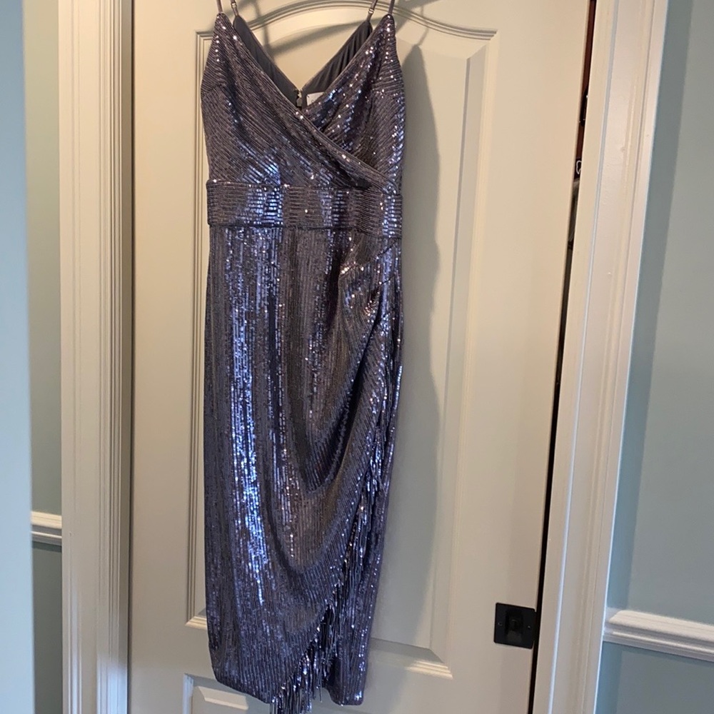 A sequenced, midi lengthened dress
